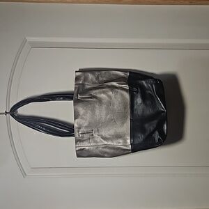 Silver and black vegan leather tote.